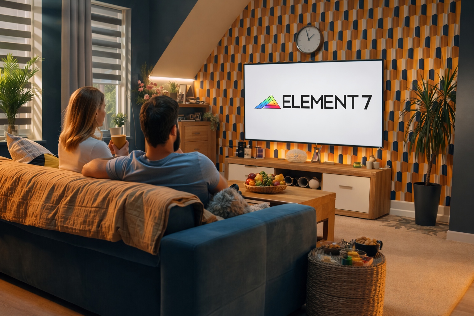 Family watching Element 7 production on TV