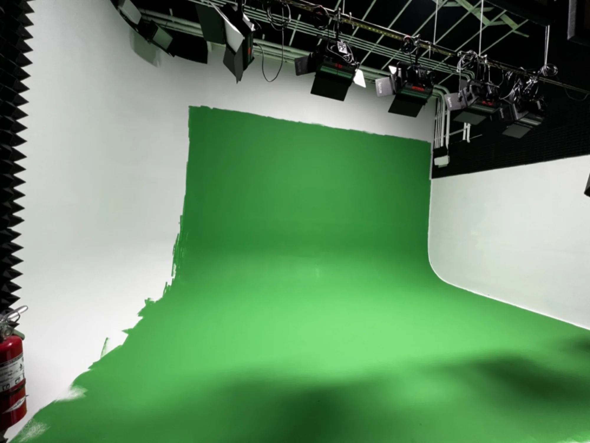 Green screen setup on studio cyc wall
